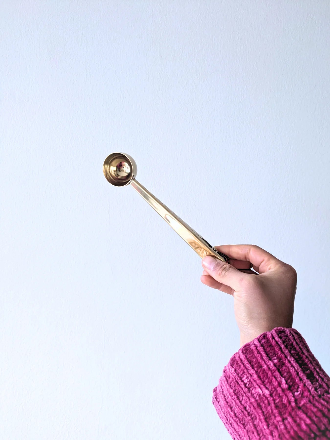 Cuchara Dorada con Pinza